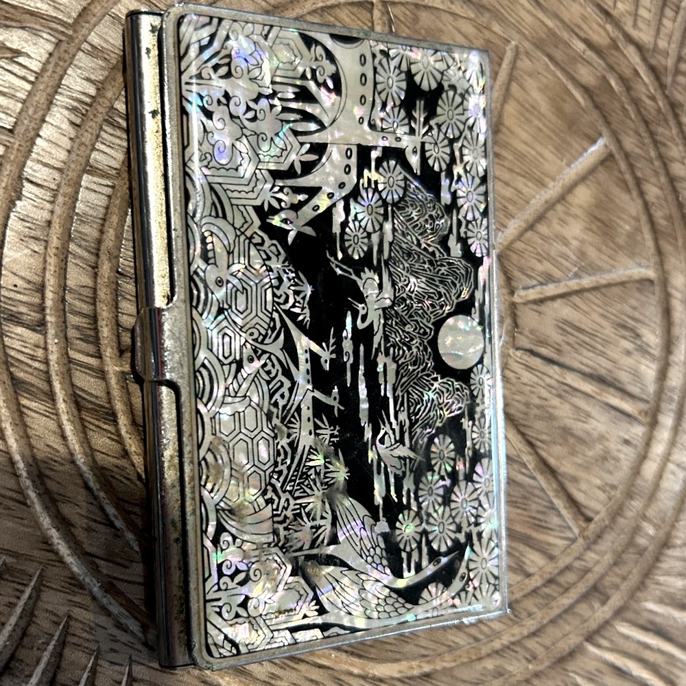 Intricate Black and Silver Card Holder with opal accents